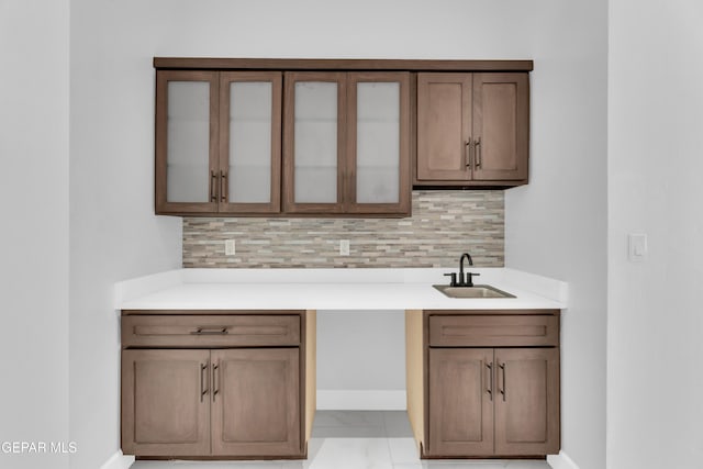 7549 Enchanted Park Dr 706849, El Paso, TX 79911 - bar with decorative backsplash and light marble finish floors
