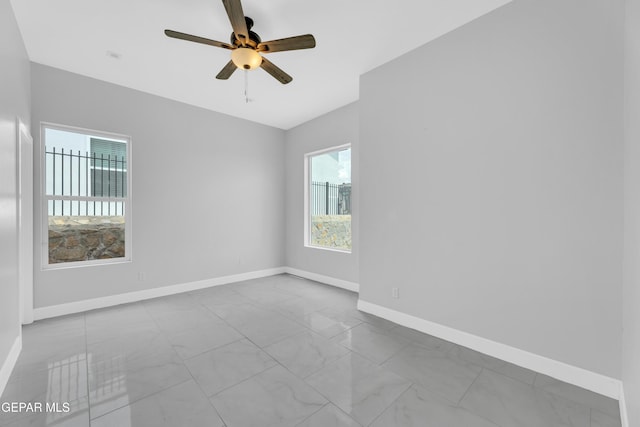 7549 Enchanted Park Dr 706849, El Paso, TX 79911 - empty room featuring marble look tile flooring and ceiling fan