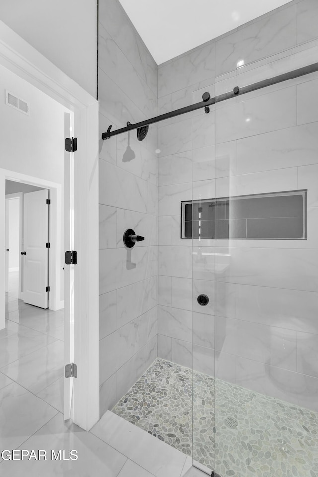 7549 Enchanted Park Dr 706849, El Paso, TX 79911 - bathroom with a shower stall and tile patterned flooring