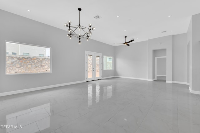 7549 Enchanted Park Dr 706849, El Paso, TX 79911 - unfurnished room featuring french doors, marble look tiles, a chandelier, ceiling fan, and recessed lighting
