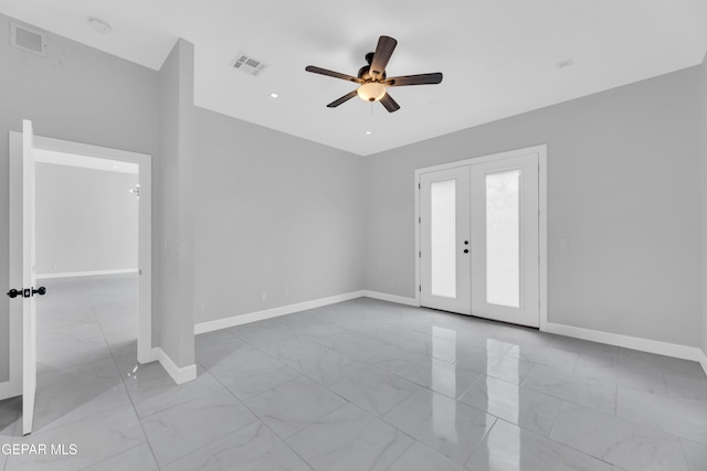 7549 Enchanted Park Dr 706849, El Paso, TX 79911 - empty room featuring marble finish floors, ceiling fan, french doors, and a smoke detector