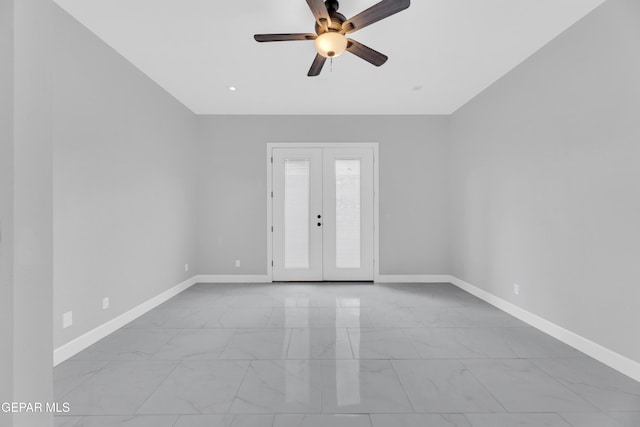 7549 Enchanted Park Dr 706849, El Paso, TX 79911 - spare room with marble finish floors, a ceiling fan, and french doors