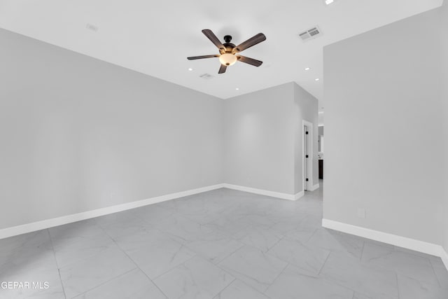 7549 Enchanted Park Dr 706849, El Paso, TX 79911 - unfurnished room with ceiling fan, marble look tile flooring, and recessed lighting