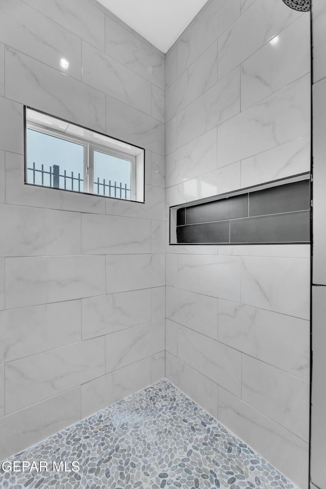 7549 Enchanted Park Dr 706849, El Paso, TX 79911 - full bathroom with a tile shower