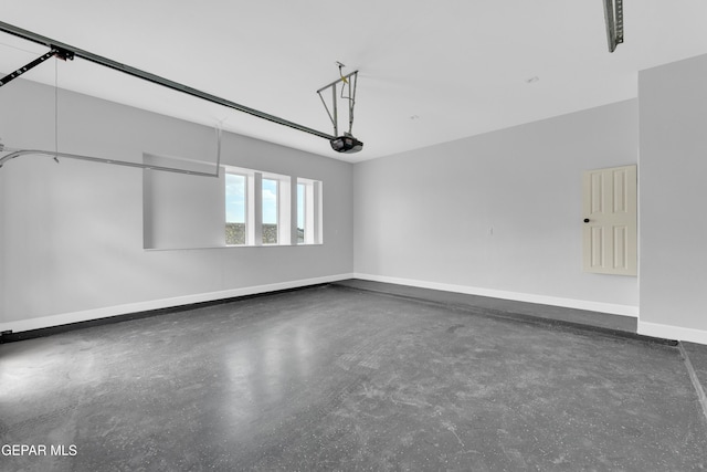 7549 Enchanted Park Dr 706849, El Paso, TX 79911 - garage with a garage door opener and baseboards