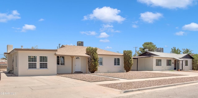 224 Ben Swain Dr, El Paso, TX 79915 - ranch-style house with stucco siding and driveway