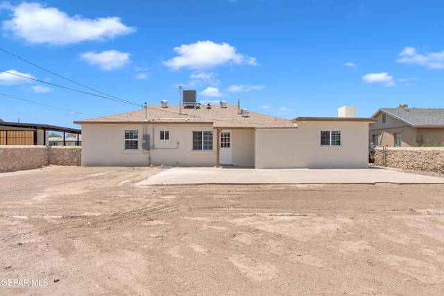 224 Ben Swain Dr, El Paso, TX 79915 - back of house with stucco siding and a patio