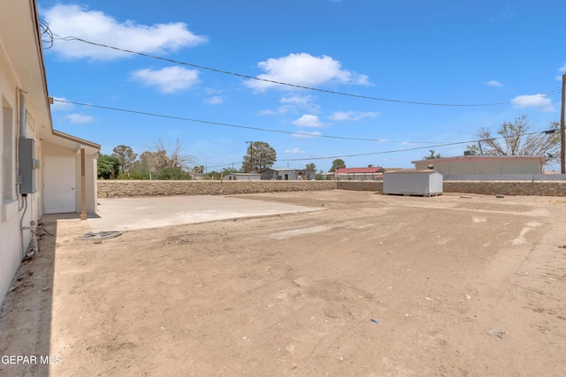 224 Ben Swain Dr, El Paso, TX 79915 - view of yard with a storage unit