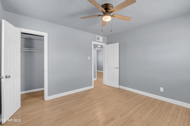 224 Ben Swain Dr, El Paso, TX 79915 - unfurnished bedroom with light wood finished floors, a closet, and a ceiling fan