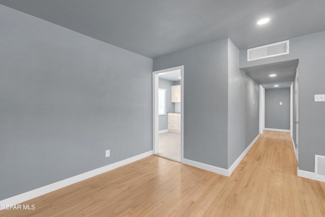 224 Ben Swain Dr, El Paso, TX 79915 - unfurnished room featuring light wood-style floors and recessed lighting