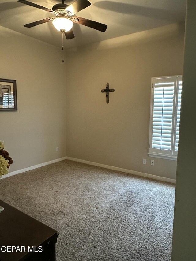 6688 Tuscany Ridge Dr, El Paso, TX 79912 - carpeted empty room featuring ceiling fan and baseboards