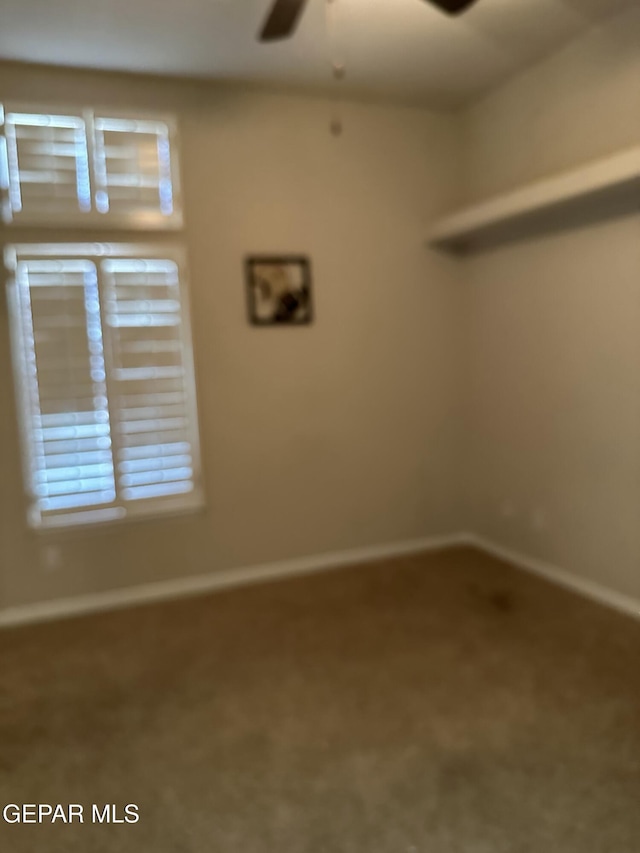 6688 Tuscany Ridge Dr, El Paso, TX 79912 - carpeted empty room with a ceiling fan and baseboards