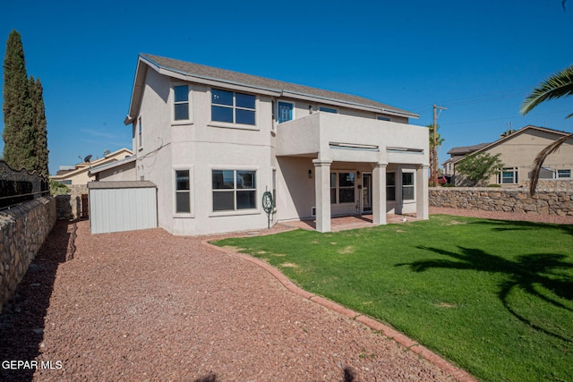 448 Ghost Flower St, Horizon City, TX 79928 - rear view of house with a balcony, stucco siding, a fenced backyard, and a patio