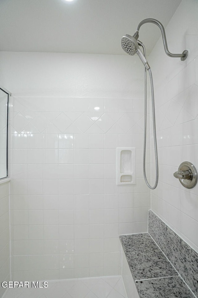 448 Ghost Flower St, Horizon City, TX 79928 - full bathroom featuring a tile shower