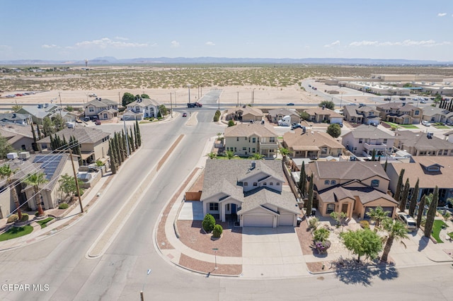 448 Ghost Flower St, Horizon City, TX 79928 - aerial perspective of suburban area featuring a mountainous background