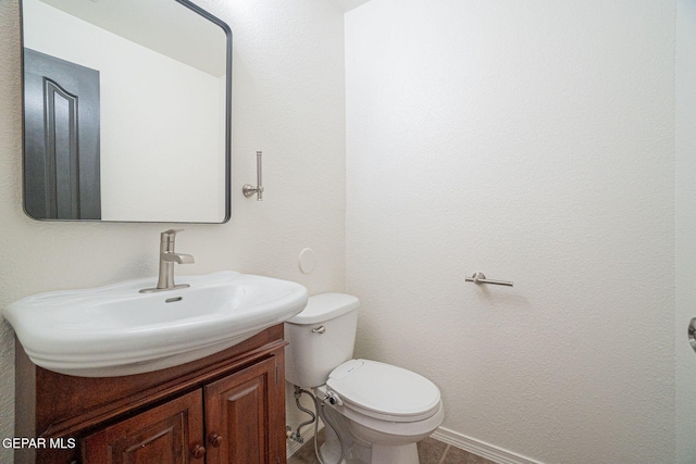 448 Ghost Flower St, Horizon City, TX 79928 - half bathroom featuring vanity and tile patterned floors