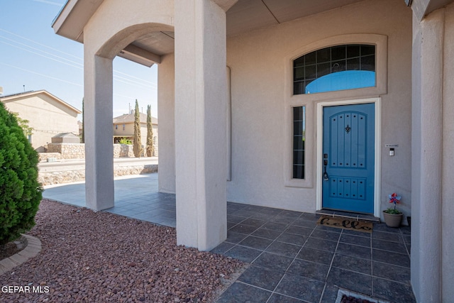 448 Ghost Flower St, Horizon City, TX 79928 - property entrance featuring stucco siding