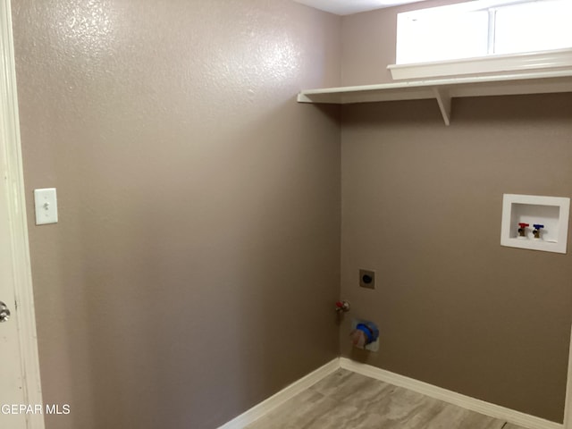 683 Juan Munoz Ct, El Paso, TX 79932 - laundry room featuring electric dryer hookup and hookup for a washing machine