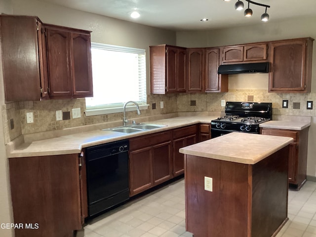 683 Juan Munoz Ct, El Paso, TX 79932 - kitchen featuring black appliances, under cabinet range hood, backsplash, light countertops, and light tile patterned floors