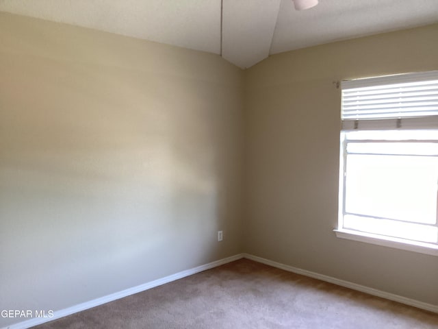 683 Juan Munoz Ct, El Paso, TX 79932 - empty room with vaulted ceiling and carpet flooring