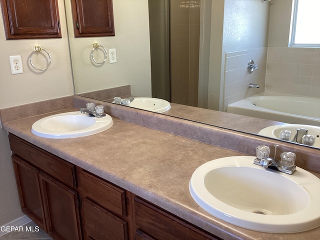 683 Juan Munoz Ct, El Paso, TX 79932 - full bath with double vanity and a garden tub