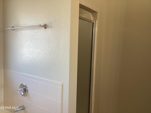 683 Juan Munoz Ct, El Paso, TX 79932 - bathroom view of a stall shower and a tub to relax in