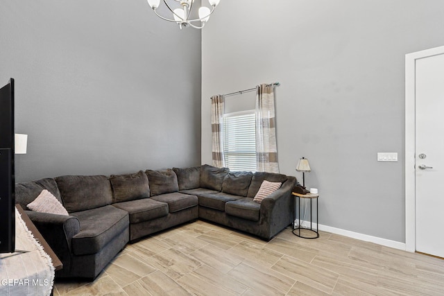 13594 Gatton St, El Paso, TX 79928 - living area featuring a chandelier, wood finish floors, and a towering ceiling