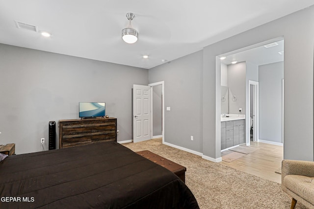 13594 Gatton St, El Paso, TX 79928 - bedroom featuring light carpet, ensuite bath, and recessed lighting