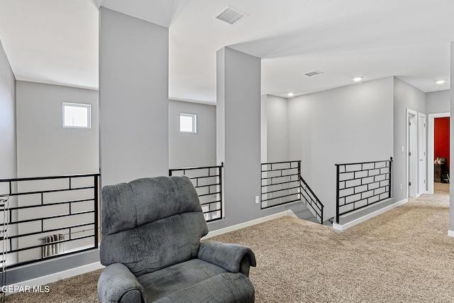 13594 Gatton St, El Paso, TX 79928 - sitting room featuring an upstairs landing, carpet floors, and recessed lighting