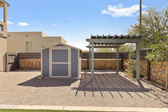 13594 Gatton St, El Paso, TX 79928 - view of patio featuring a storage shed