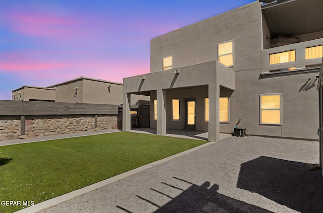 13594 Gatton St, El Paso, TX 79928 - back of house featuring a patio and stucco siding