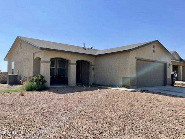 813 Nuevo Desierto Dr, Horizon City, TX 79928 - single story home with a garage, stucco siding, and concrete driveway