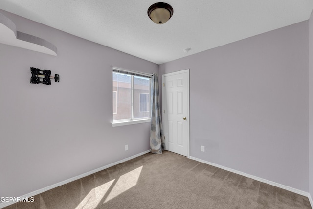 11905 Jim Webb Dr, El Paso, TX 79934 - carpeted spare room with baseboards