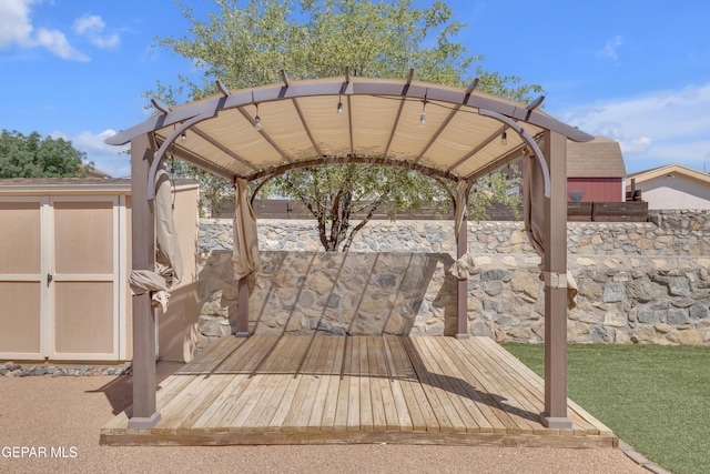 11905 Jim Webb Dr, El Paso, TX 79934 - wooden deck featuring a shed