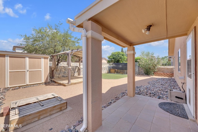 11905 Jim Webb Dr, El Paso, TX 79934 - fenced backyard with a patio area, a storage shed, and a pergola