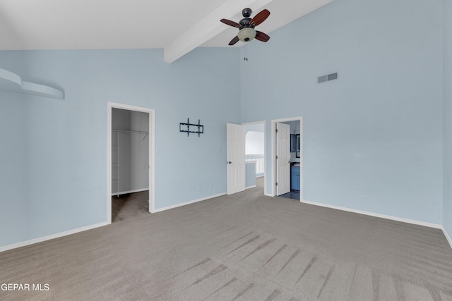 11905 Jim Webb Dr, El Paso, TX 79934 - unfurnished bedroom with carpet floors, a walk in closet, beamed ceiling, high vaulted ceiling, and ceiling fan