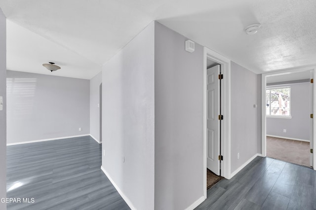 11905 Jim Webb Dr, El Paso, TX 79934 - corridor featuring wood finished floors and a textured ceiling
