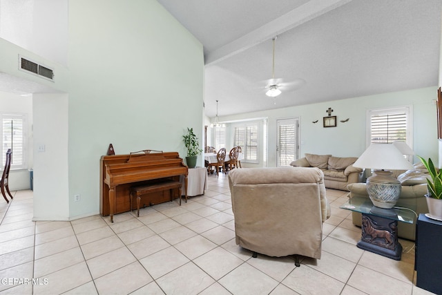 12090 Sterling Mary Way, El Paso, TX 79936 - living room with ceiling fan, high vaulted ceiling, and light tile patterned floors
