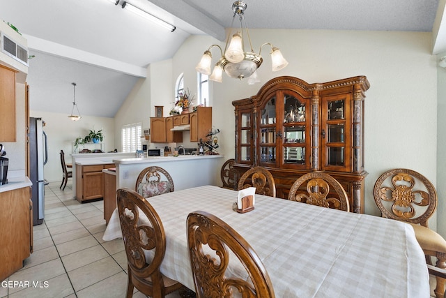 12090 Sterling Mary Way, El Paso, TX 79936 - dining area with beamed ceiling, light tile patterned floors, high vaulted ceiling, and a chandelier