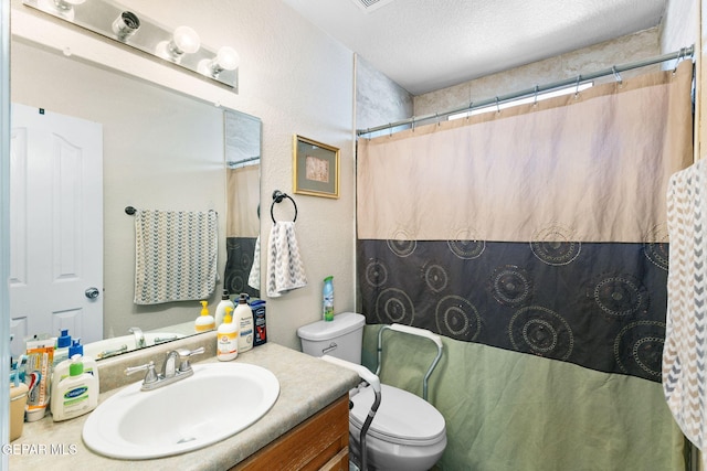 12090 Sterling Mary Way, El Paso, TX 79936 - bathroom with vanity, a shower with shower curtain, and a textured ceiling