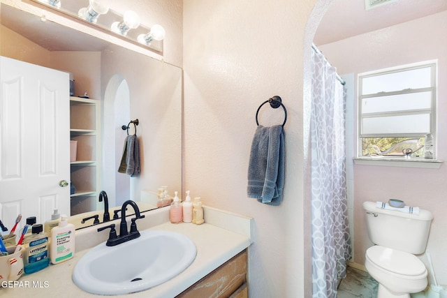 12090 Sterling Mary Way, El Paso, TX 79936 - full bath featuring vanity and a shower with shower curtain