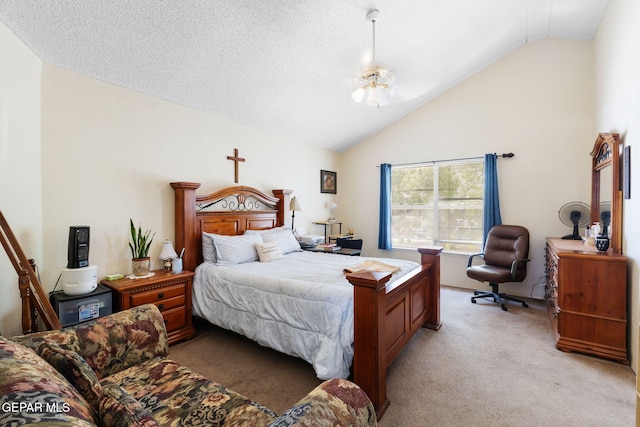 12090 Sterling Mary Way, El Paso, TX 79936 - bedroom featuring light colored carpet and high vaulted ceiling