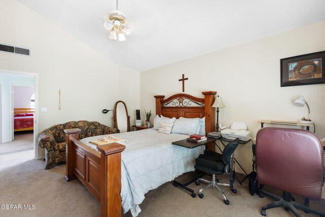 12090 Sterling Mary Way, El Paso, TX 79936 - bedroom with light carpet and vaulted ceiling