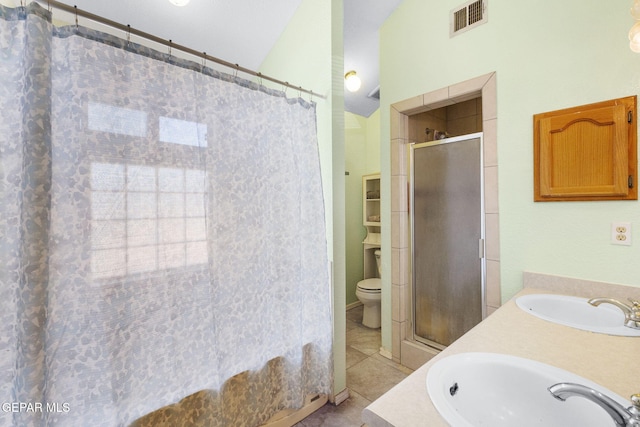 12090 Sterling Mary Way, El Paso, TX 79936 - bathroom featuring a stall shower, tile patterned flooring, double vanity, and lofted ceiling