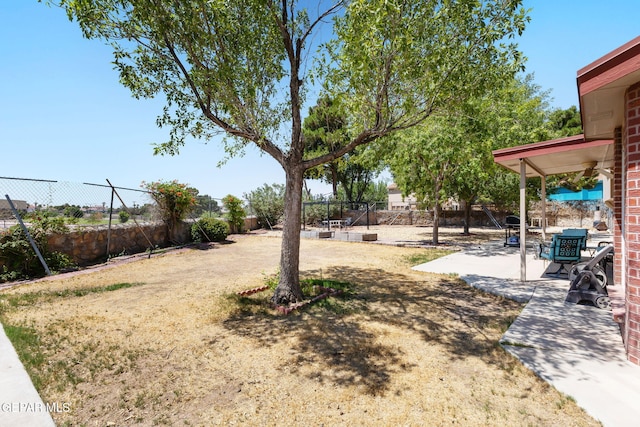 12090 Sterling Mary Way, El Paso, TX 79936 - fenced backyard with a patio