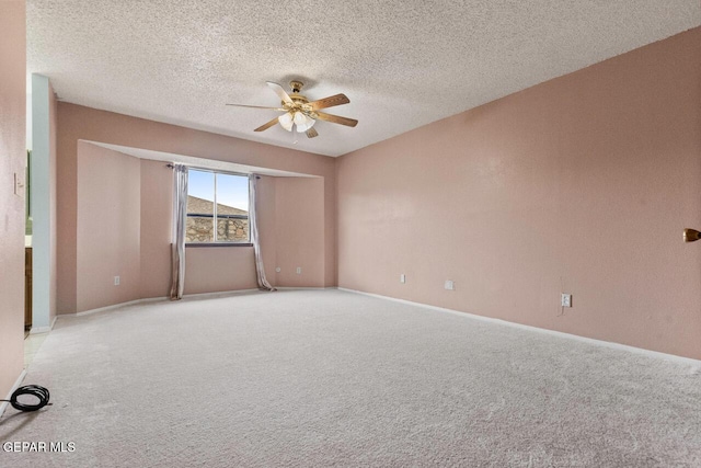 4821 Round Rock Dr, El Paso, TX 79924 - unfurnished room with ceiling fan, light colored carpet, and a textured ceiling