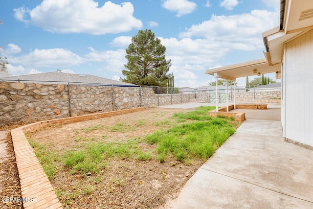 4821 Round Rock Dr, El Paso, TX 79924 - fenced backyard with a patio area