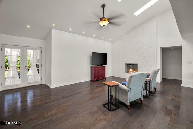 10121 Monaco Dr, El Paso, TX 79925 - living area featuring high vaulted ceiling, ceiling fan, a large fireplace, recessed lighting, and dark wood finished floors