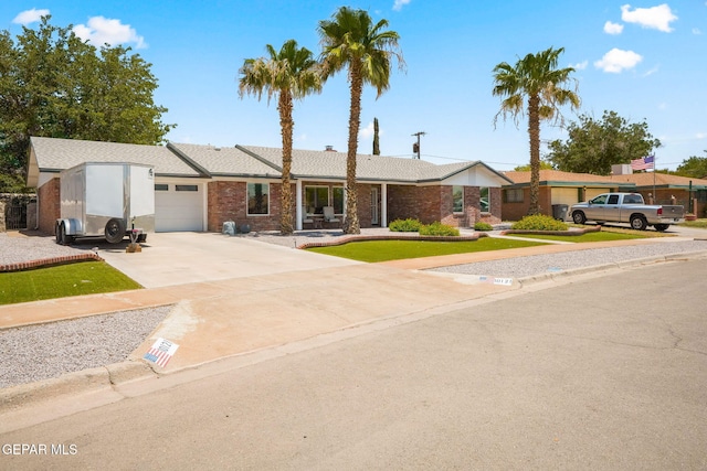10121 Monaco Dr, El Paso, TX 79925 - single story home featuring a garage and concrete driveway