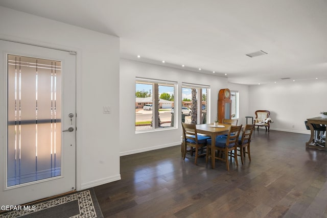 10121 Monaco Dr, El Paso, TX 79925 - dining room with recessed lighting and dark wood-style flooring